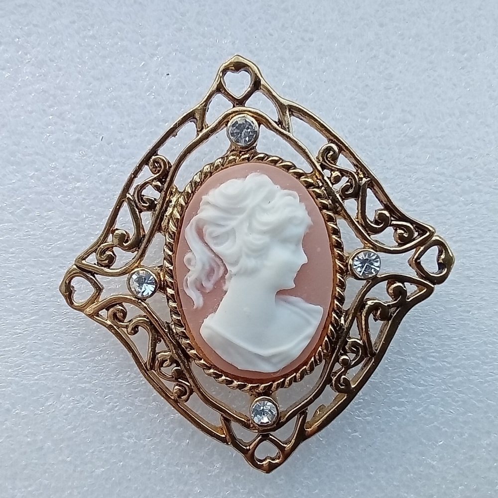 Vintage AAI Gold Tone Faux White Cameo Brooch With Rhinestone